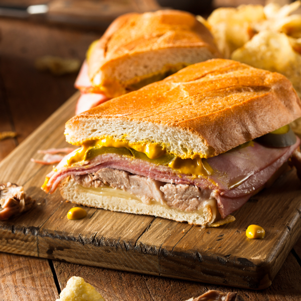 traditional Cuban
                            Sandwiches with Ham Pork and Cheese By Brent
                            Hofacker_Shutterstock.com