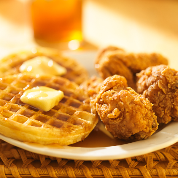 chicken and
                            waffles with sweet tea in background By Joshua
                            Resnick_Shutterstock.com
