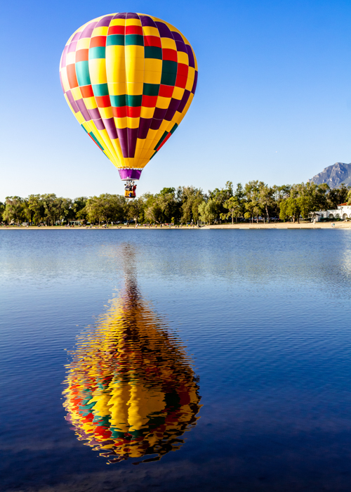 Multi-colored hot air balloon By
                                        Teri Virbickis_Shutterstock.com