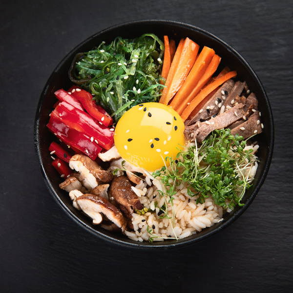 Bibimbap -
                            traditional Korean dish with rice, vegetables,
                            beef_bitt24_shutterstock.com