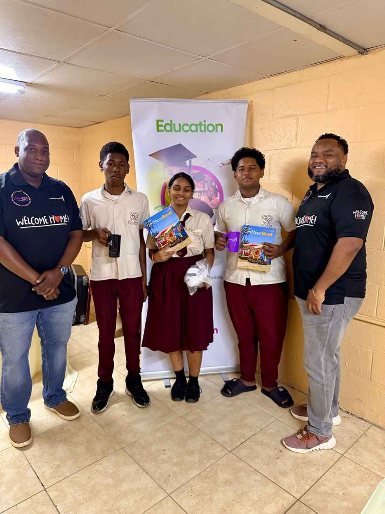 Kelvin-and-Rohan-with-students