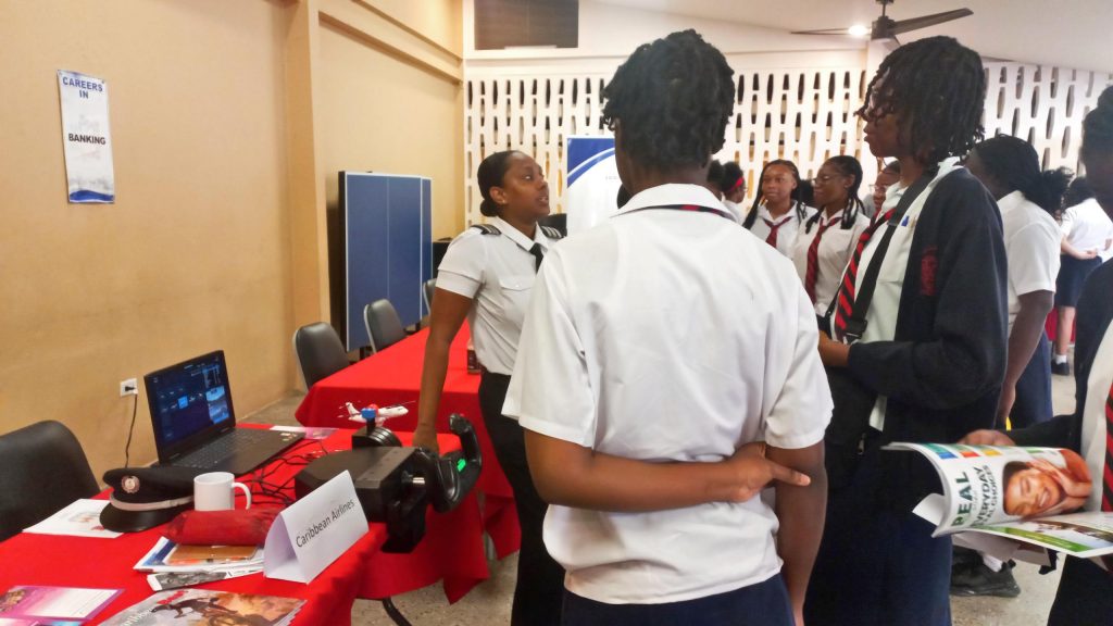 Pilot interactng with students